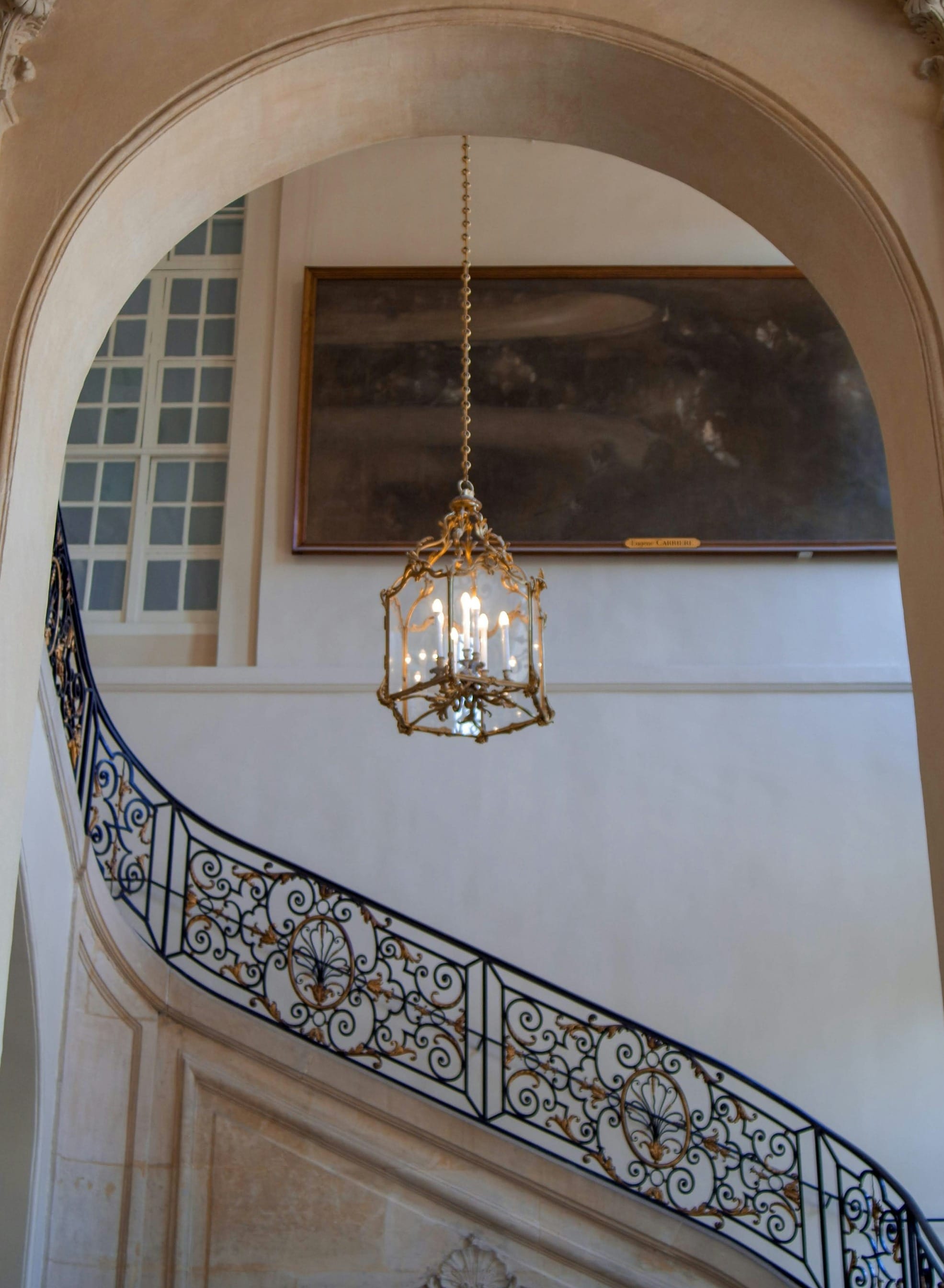 gold and white pendant lamp